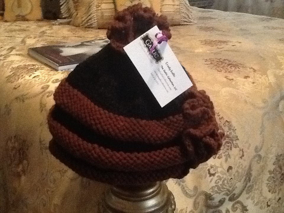 Black and Brown Hat with Stylish Features $40. USD