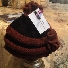 Black and Brown Hat with Stylish Features $40. USD